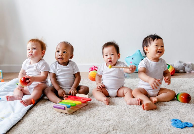 babies-playing-together-play-room